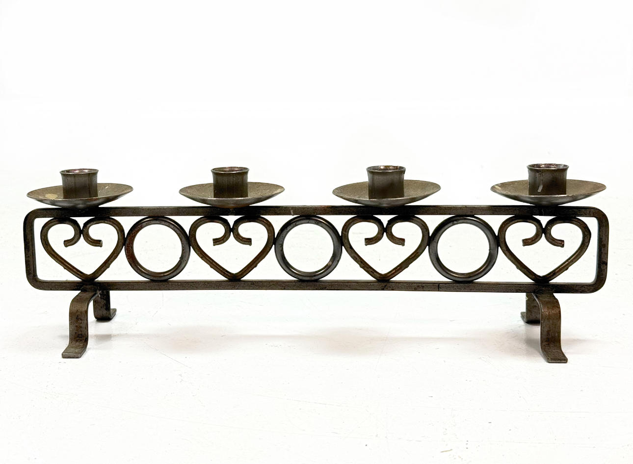 A metal candlestick 1970's.