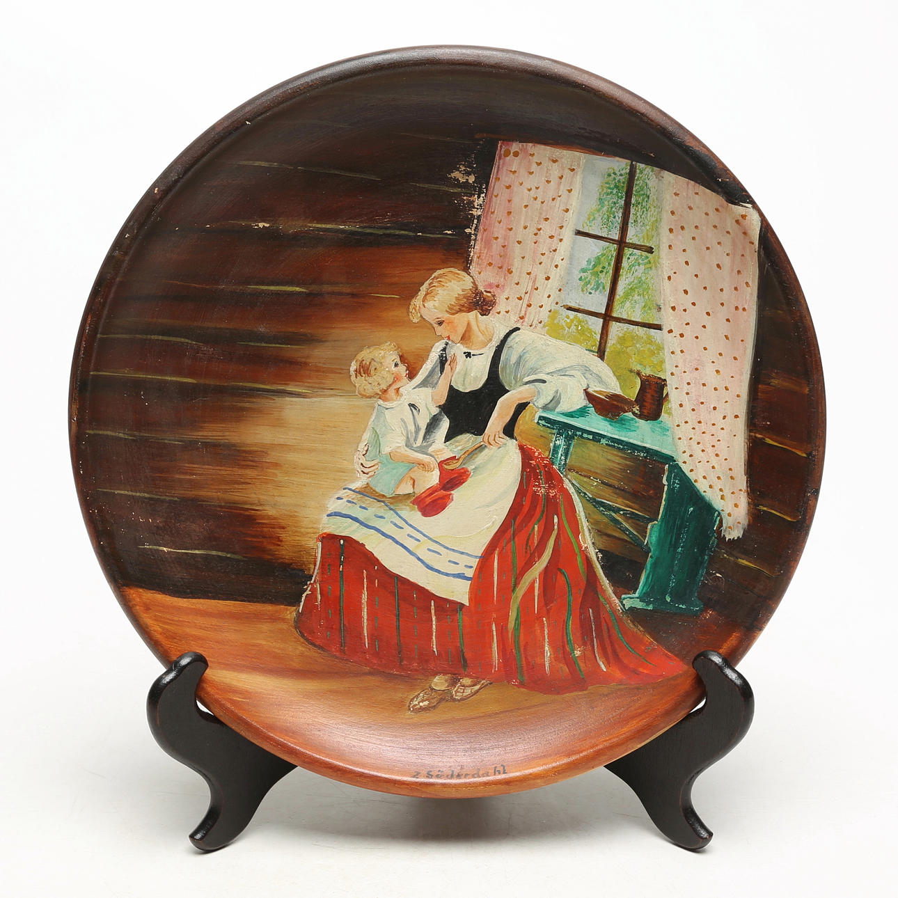 OIDENTIFIERAD KONSTNÄR. A ceramic wall plate, painted with oil paint, signed Söderdahl.