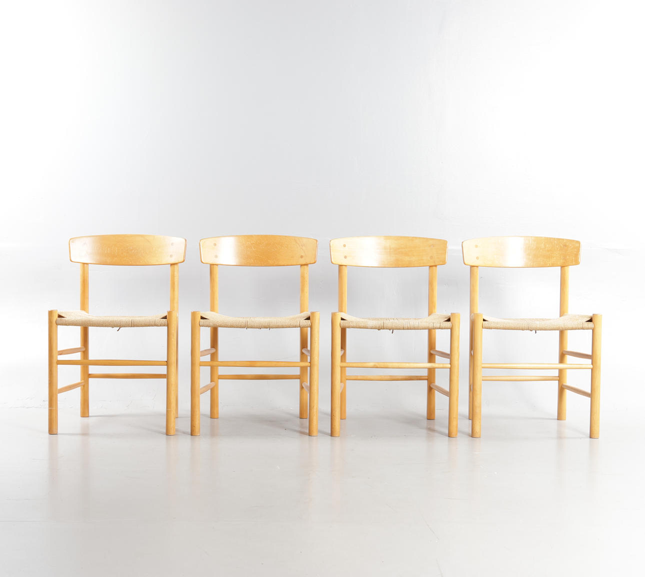 BØRGE MOGENSEN. Set of four 'Folkestoles' with frames of beech, seats fitted with braided paper yarn. Designed in 1947. Manufactured at FDB Møbler, model J-39. (4).