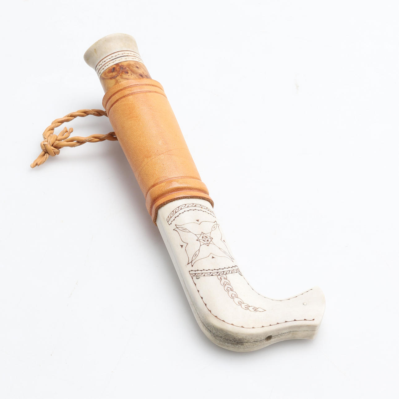 A SAMEKNIFE, reindeer horn, signed K-E P and dated 1990.