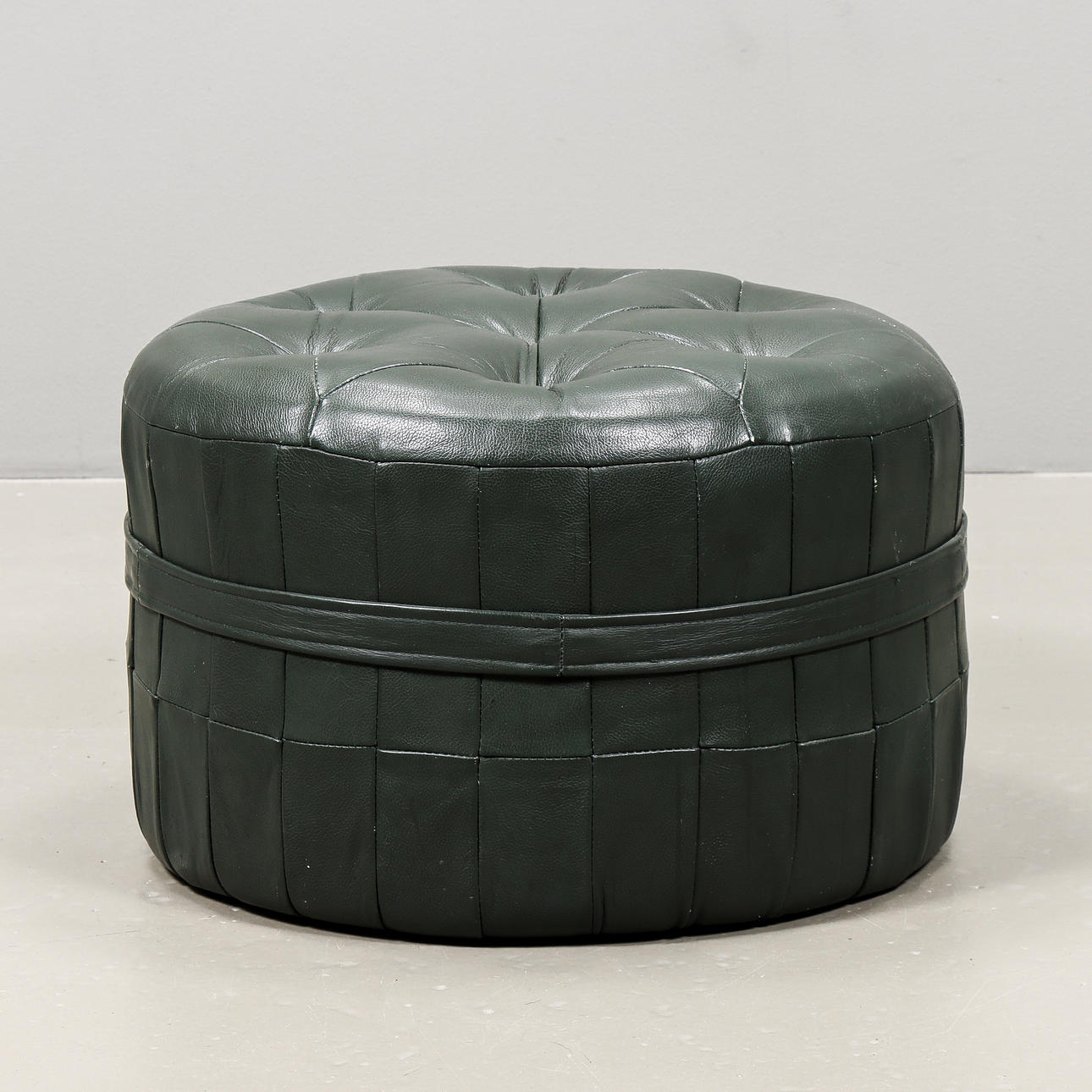 PUFF green-colored leather.