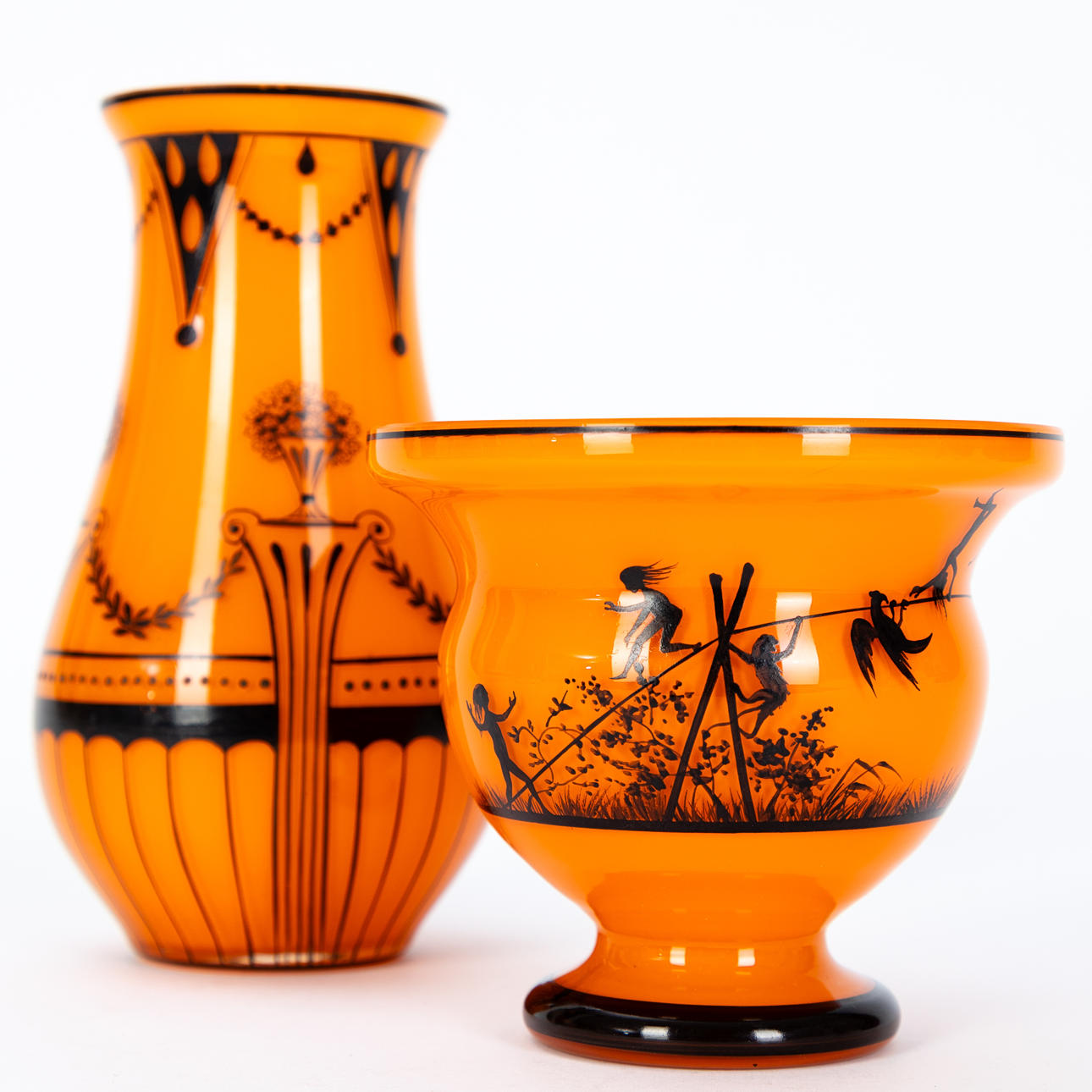 Two vases, orange-red and decorated with black solder, Bohemia, 1920s (2).