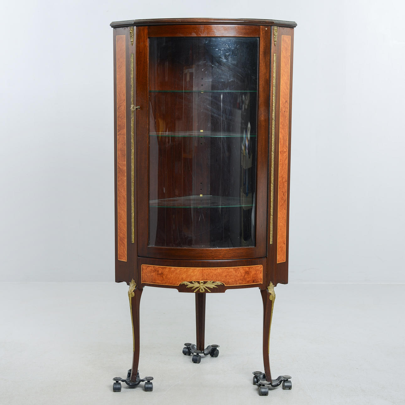 A rococo style display cabinet, 20th century.