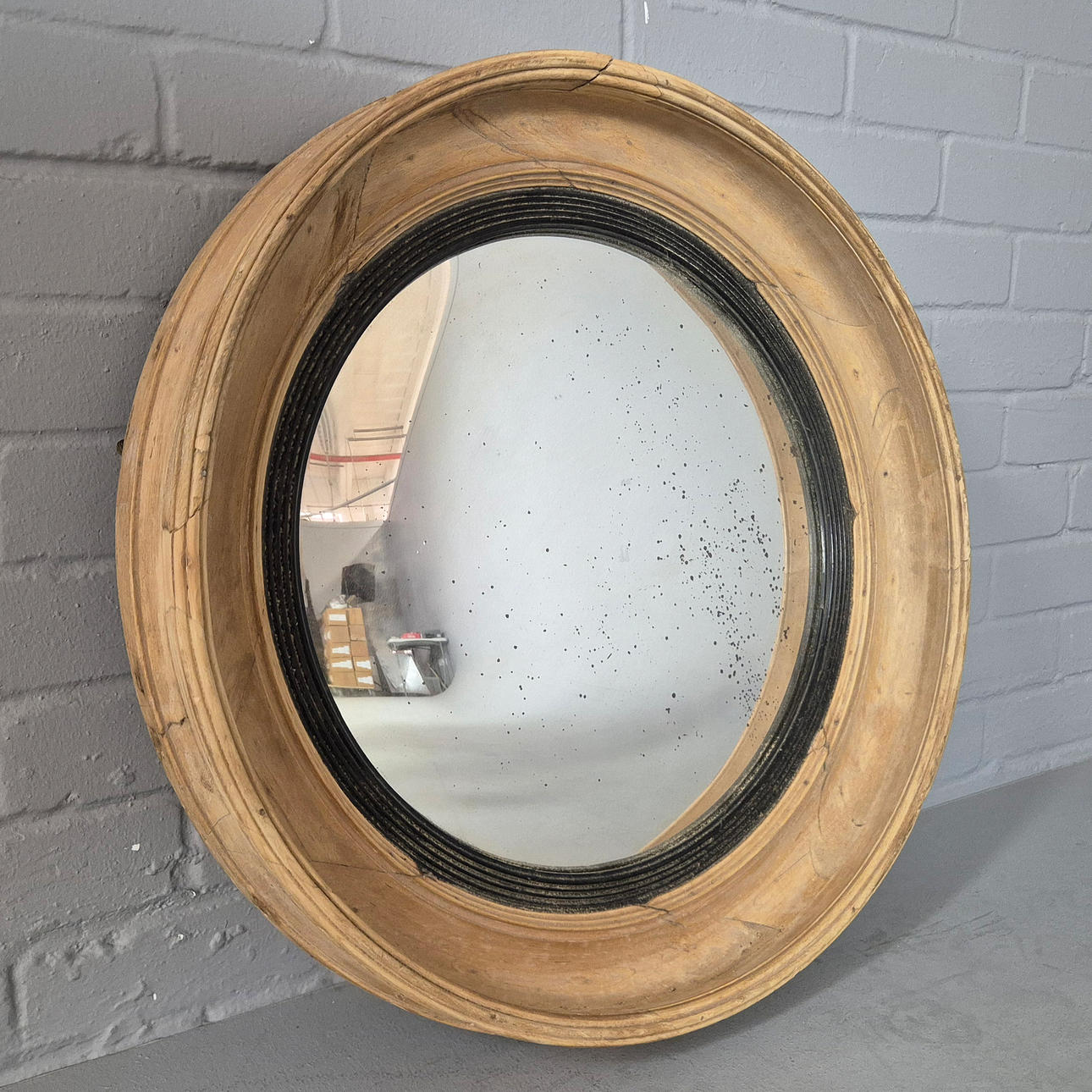 REGENCY STYLE CONVEX WALL MIRROR.