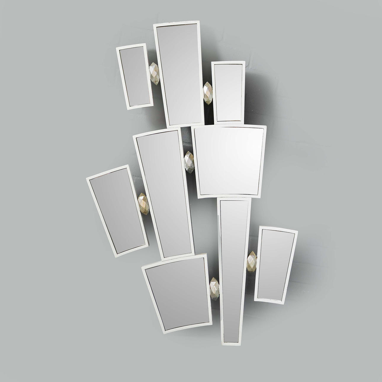 SEGMENTED WALL MIRROR.