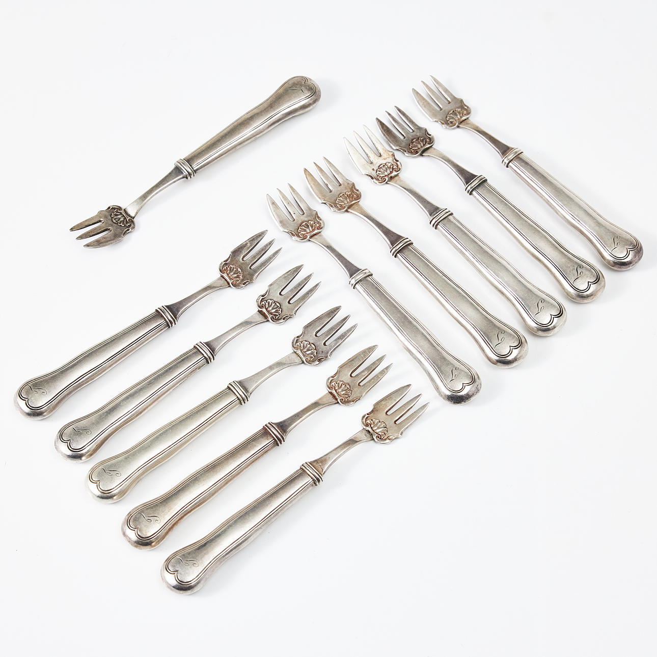 A set of 11 baking forks, silver, Denmark, H.L. Schmidt, Copenhagen, 1847.