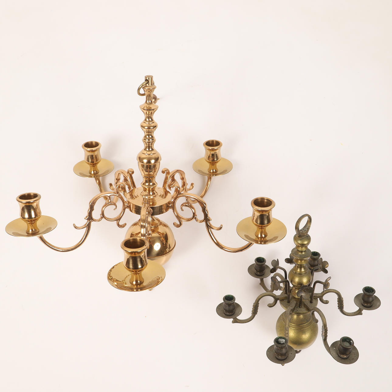 Two brass chandeliers, 20th century.