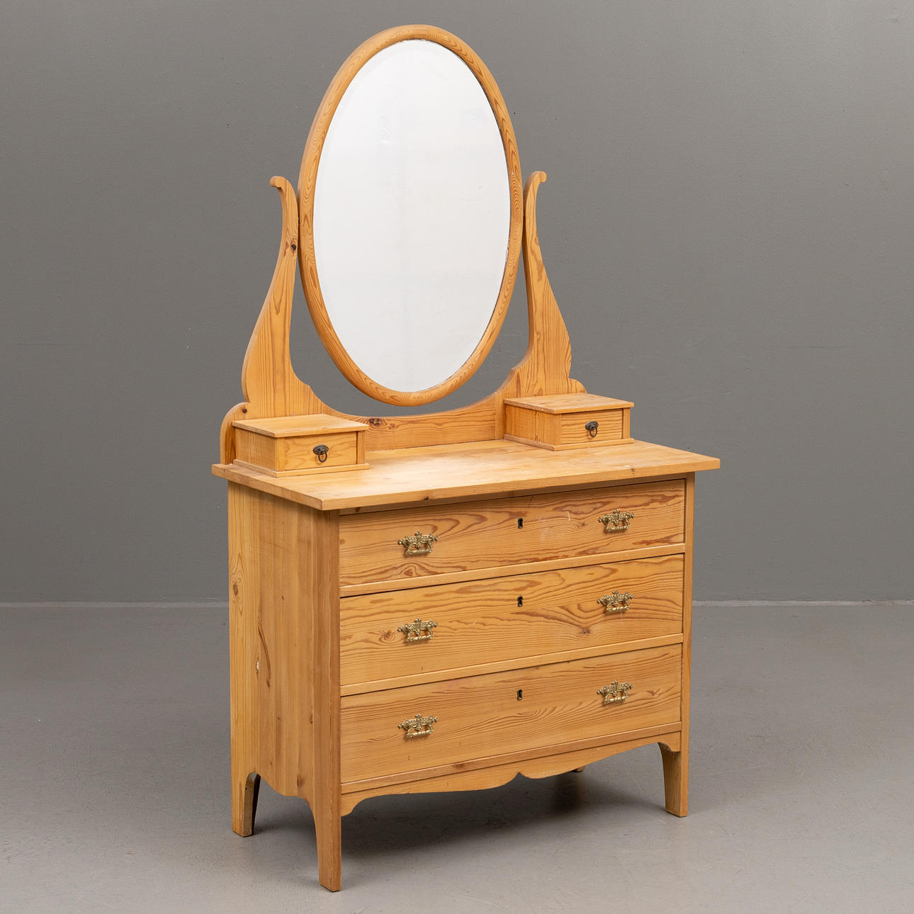A pine mirror cabinet, tilted, 20th century.