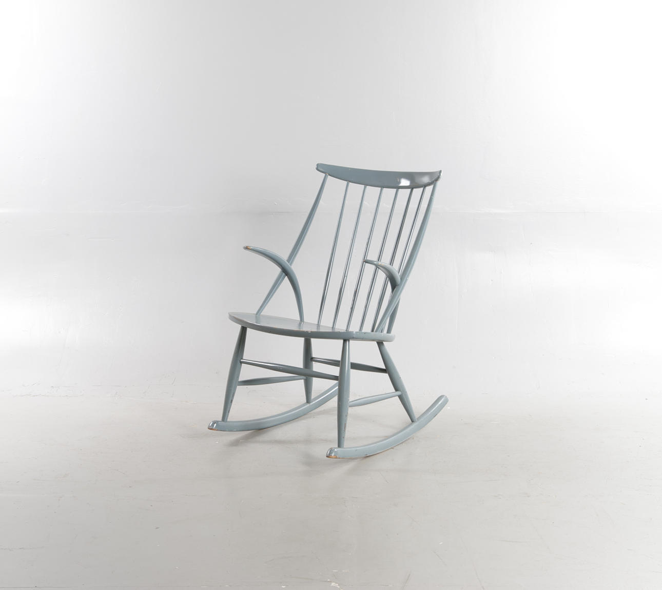 ILLUM WIKKELSO. Rocking chair with lacquered beech frame with tread back. Designed in 1958. Manufactured and branded at N. Eilersen.