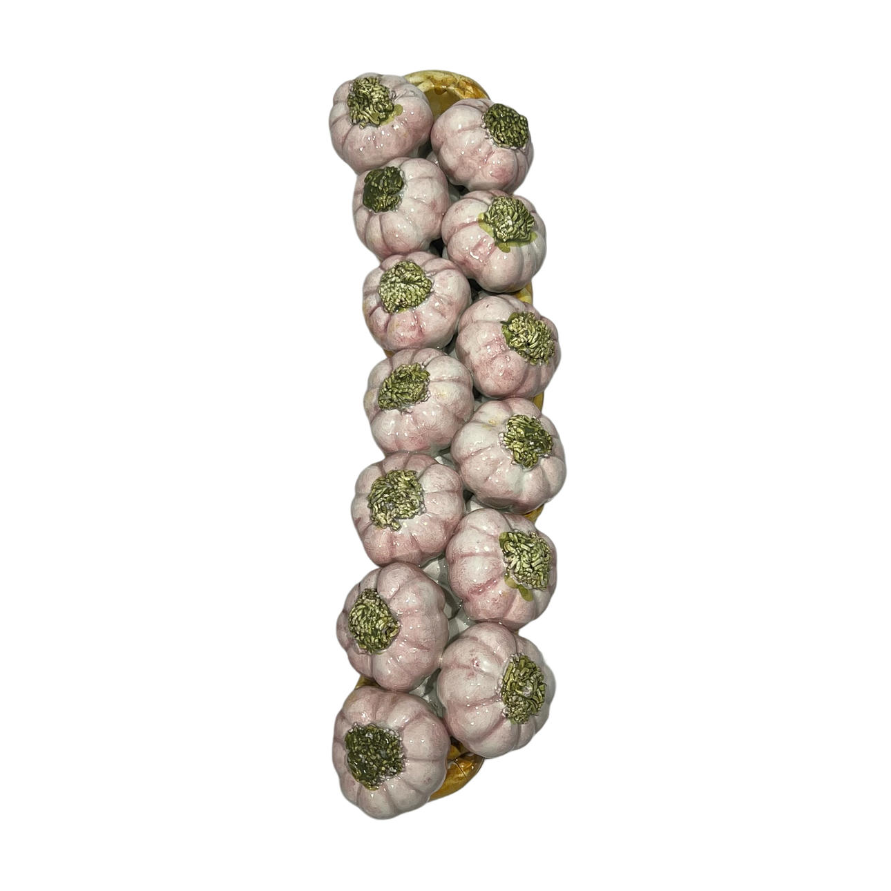 Figure of a string of garlic in enameled ceramic.