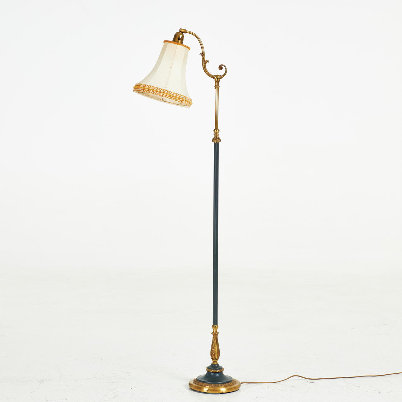 A brass floor lamp by Einar Bäckström, Malmö, 20th century.