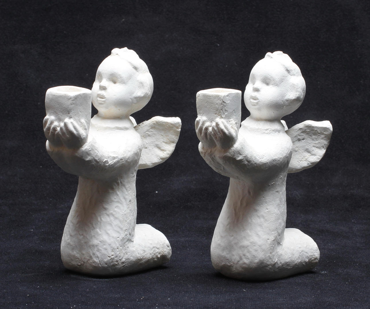 CARIN NILSON(1884-1973). Skulpturer/ljusstakar, ett par, gips, signerade.