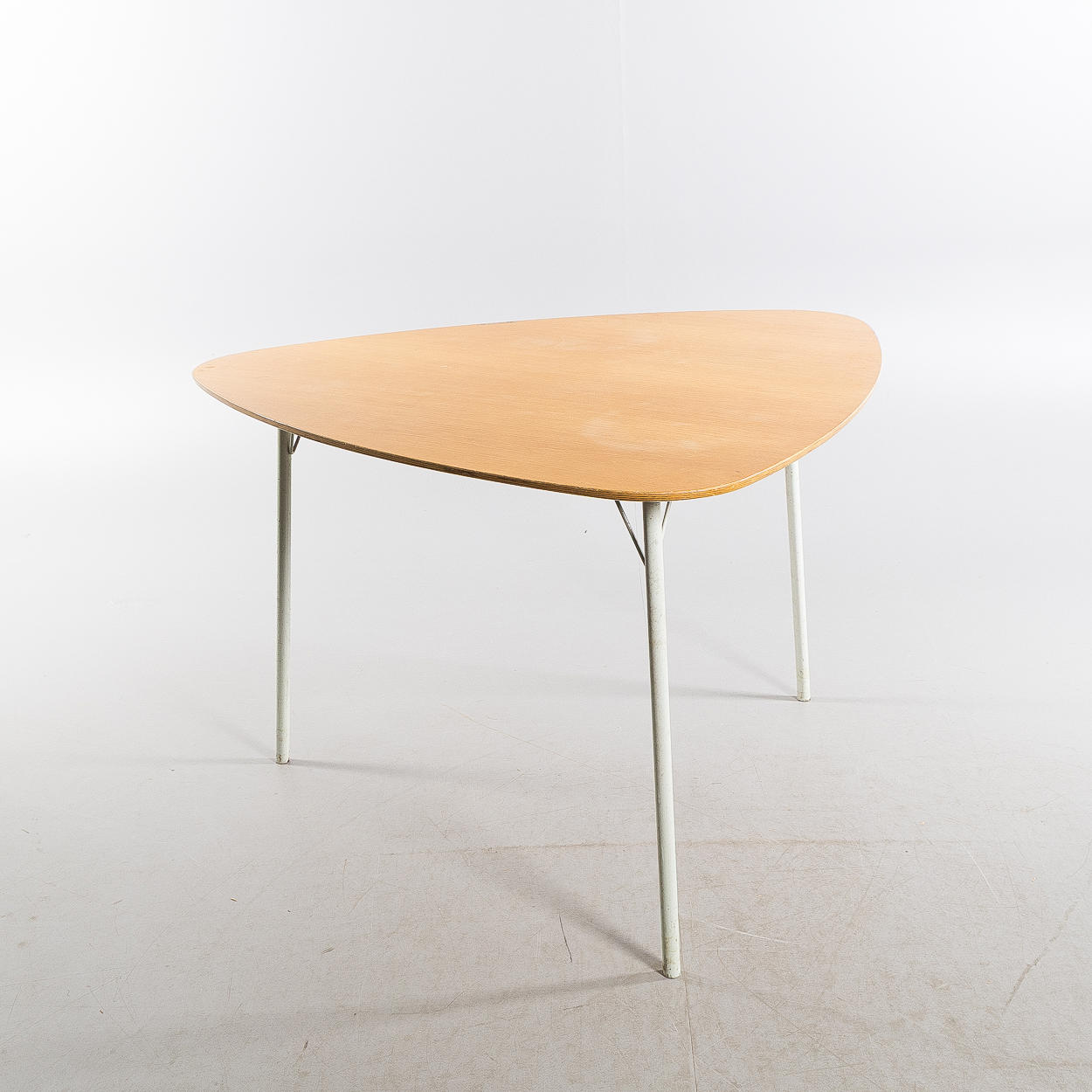 A table, triangular plate with steel tube legs, Arne Jacobsen style, second half of the 20th century.