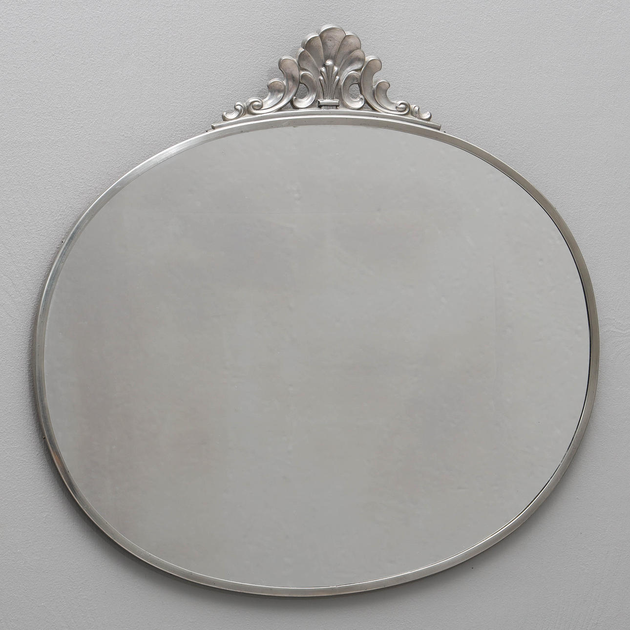 A 1920/30's art deco pewter mirror.