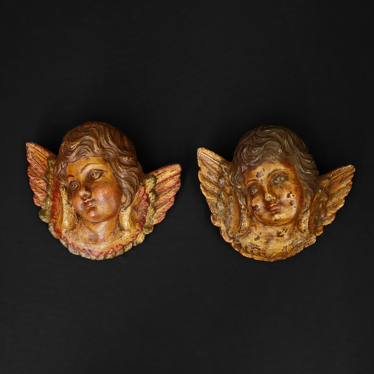 TWO CHERUBS IN POLYCHROME STUCCO. 40'S.