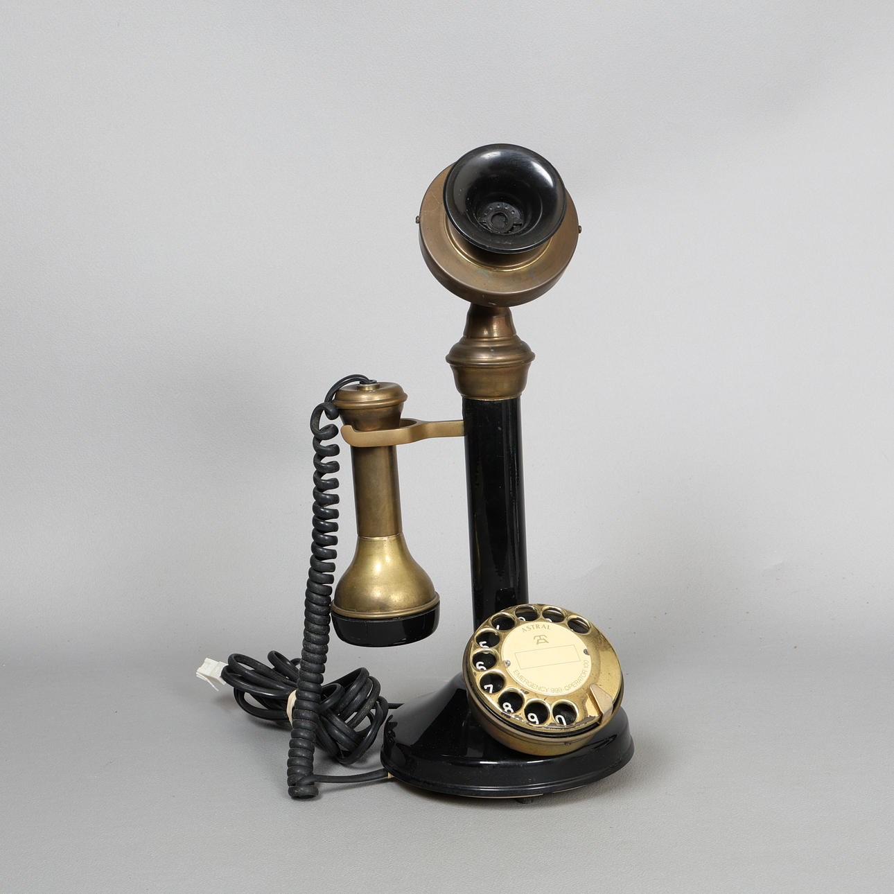 AN ASTRAL CANDLESTICK TELEPHONE.