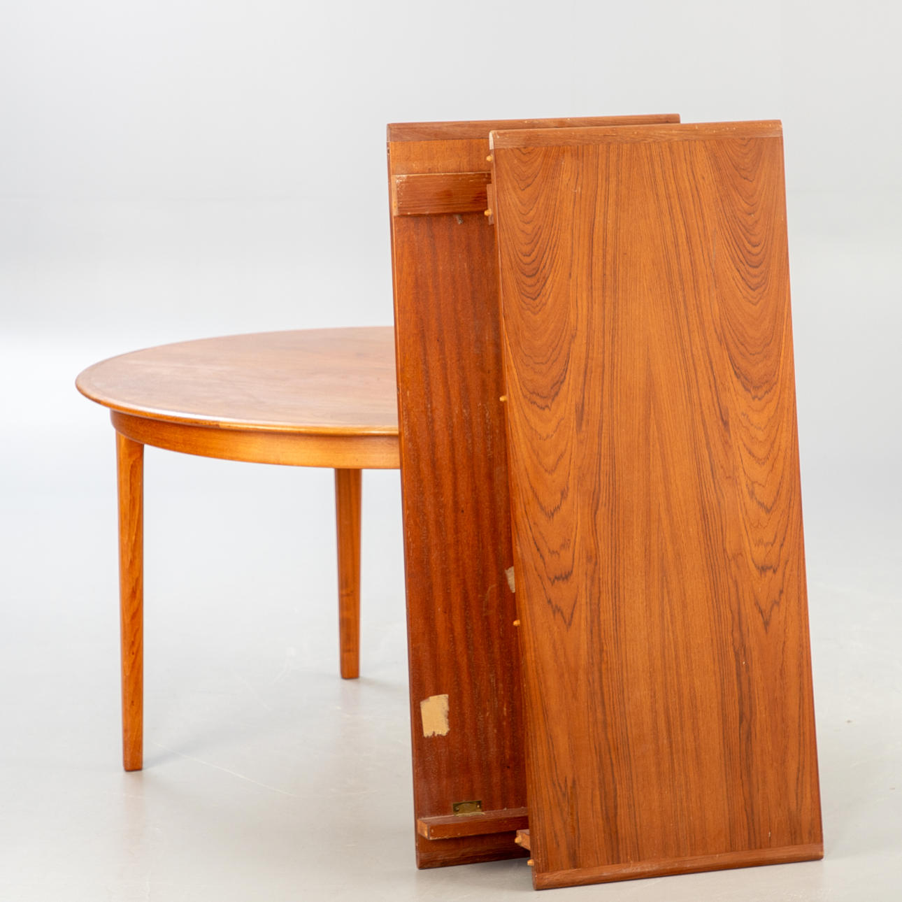 Svend Aage Madsen, extendable dining table for K Knudsen, Denmark, 1960s.