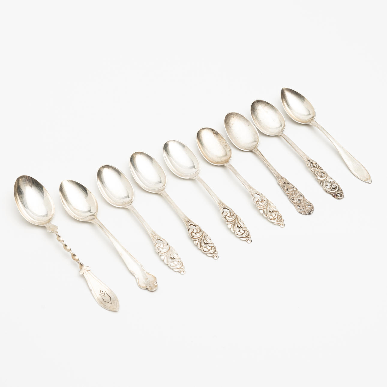 A set of 9 silver spoons, different models and masters, including Thorvald Marthinsen Sølvvarefabrikk, Norway, 20th century.