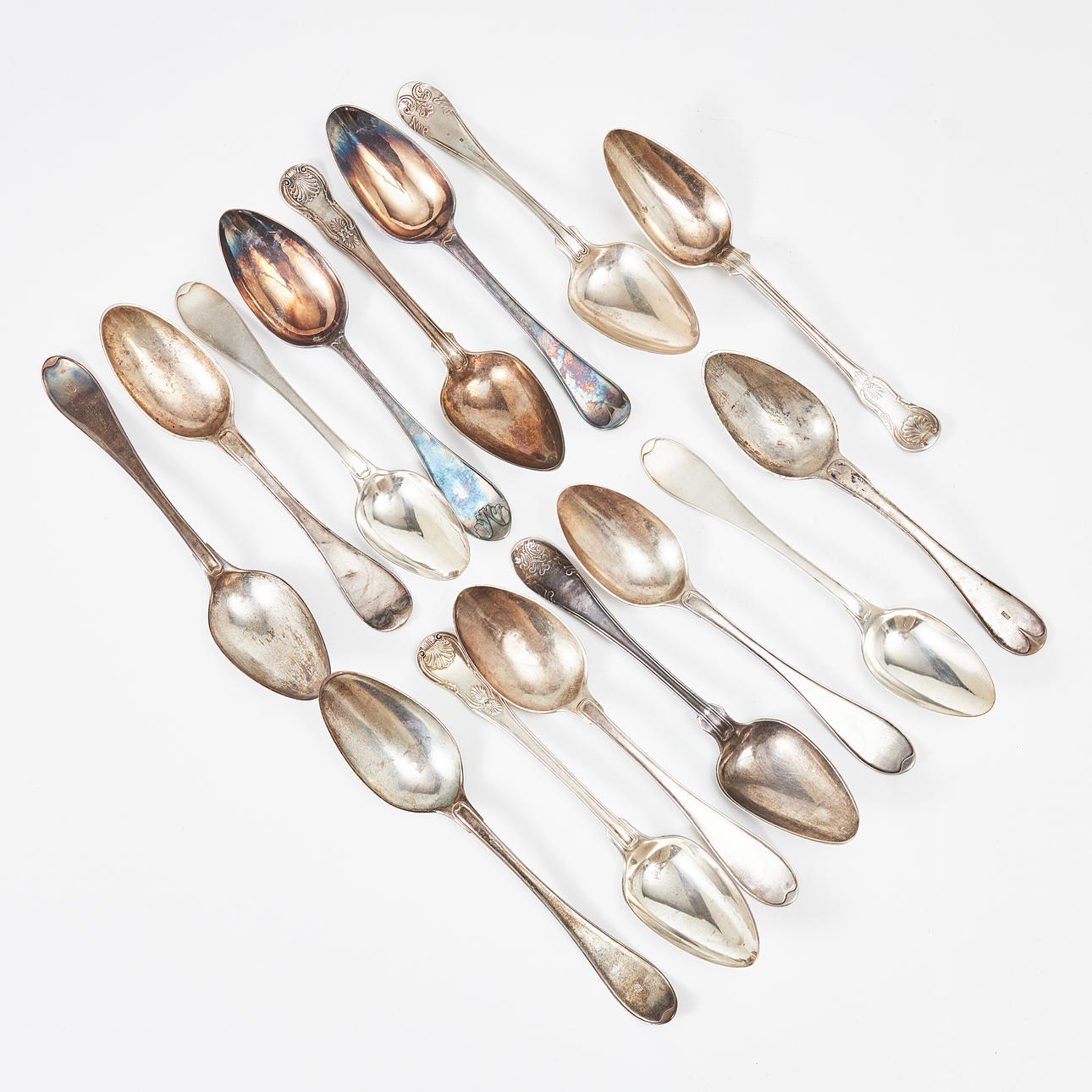 A set of 15 silver spoons, 19th century, various masters and models.