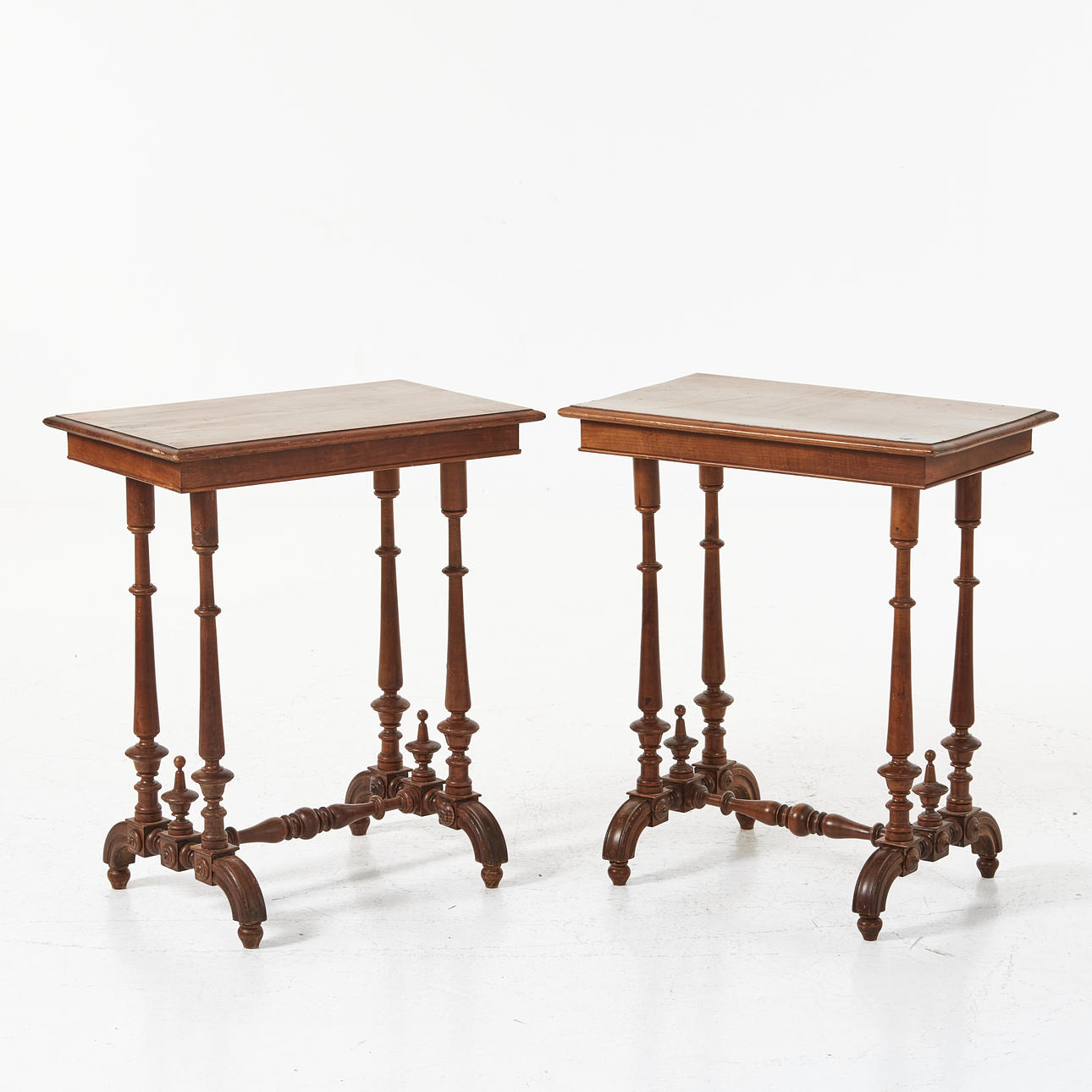 A pair of Renaissance style side tables, first half of the 20th century.
