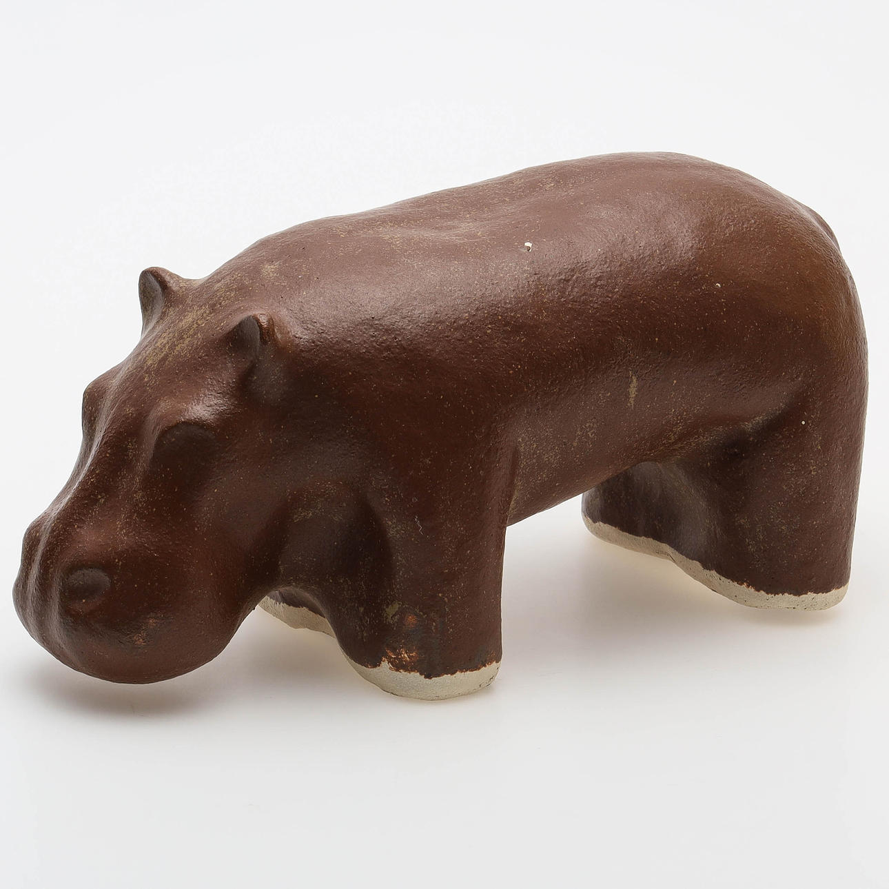 A SCULPTURE, glazed ceramic, hippopotamus, signed.