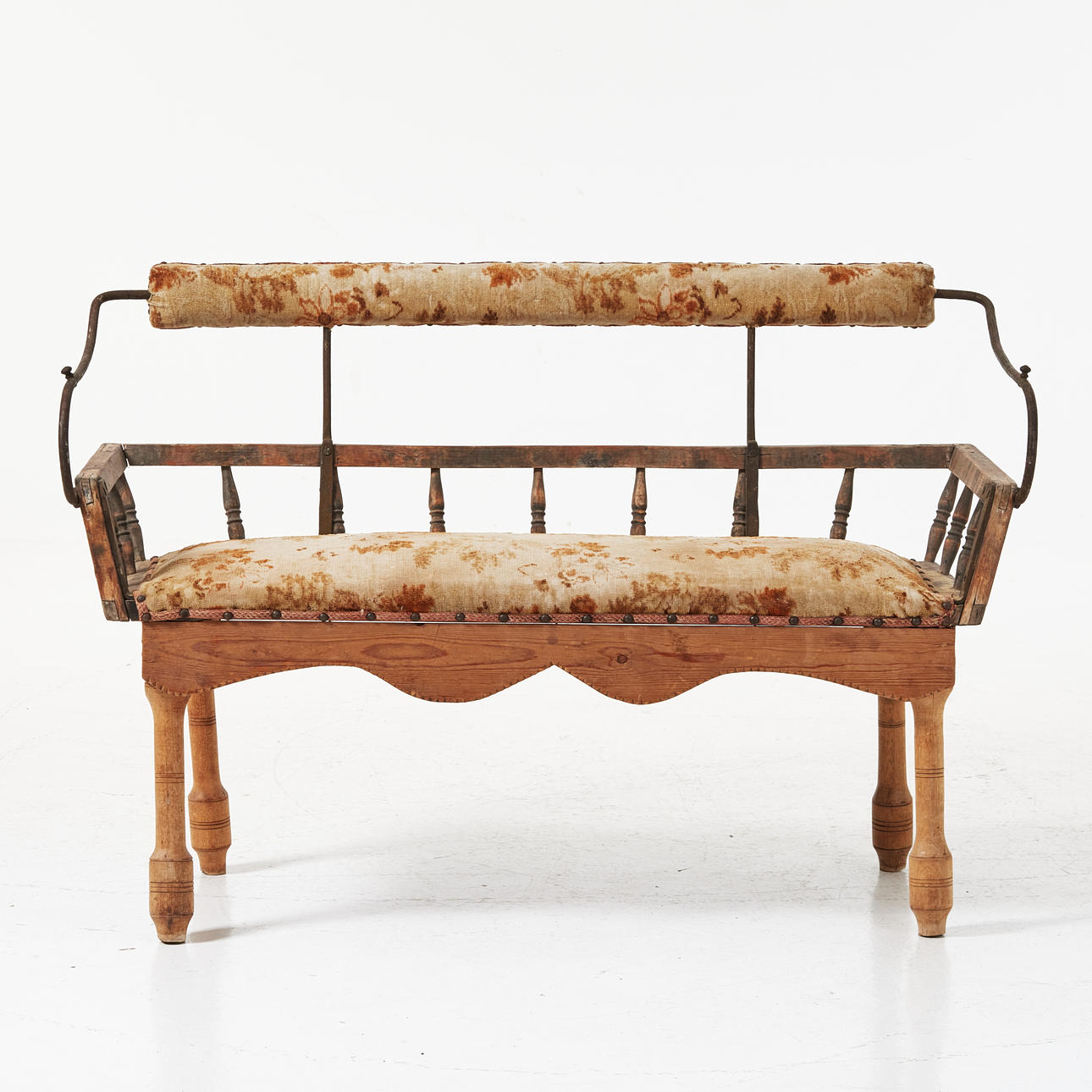 A sofa, second half of the 19th century, turned cribs, rebuilt with back from a carriage.