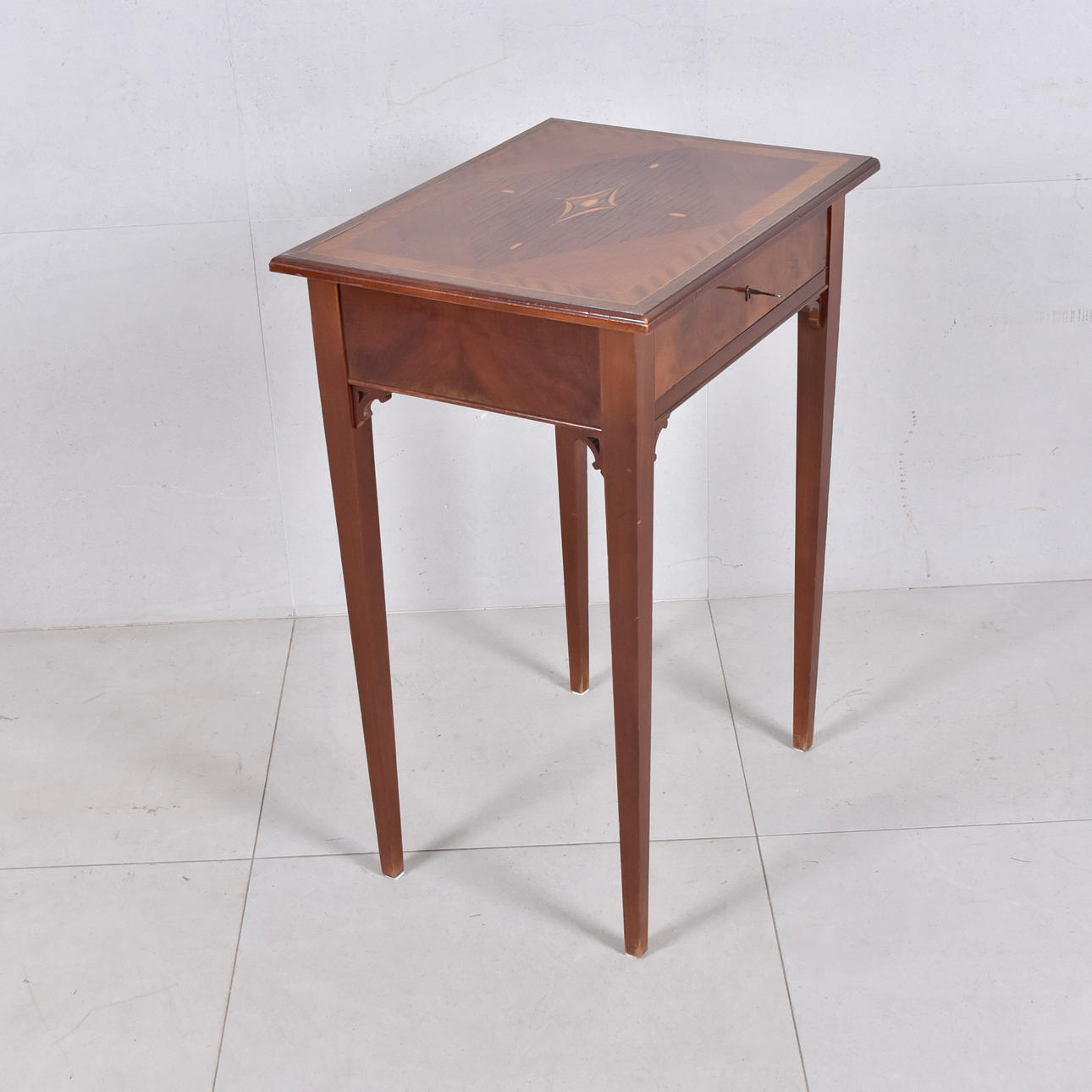 SEWING TABLE WITH DRAWER, mahogany with intarsia, second half of the 19th century.
