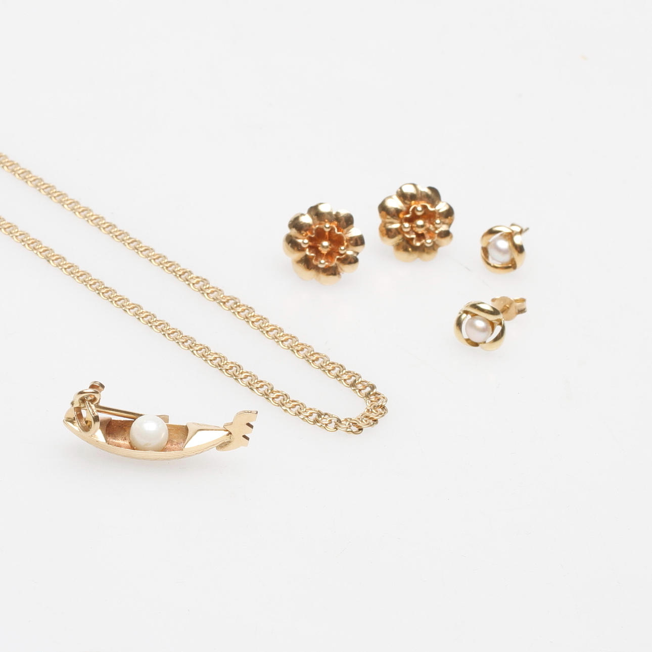 GULDSMYCKEN, 18k guld, vikt ca 9,4 gr.