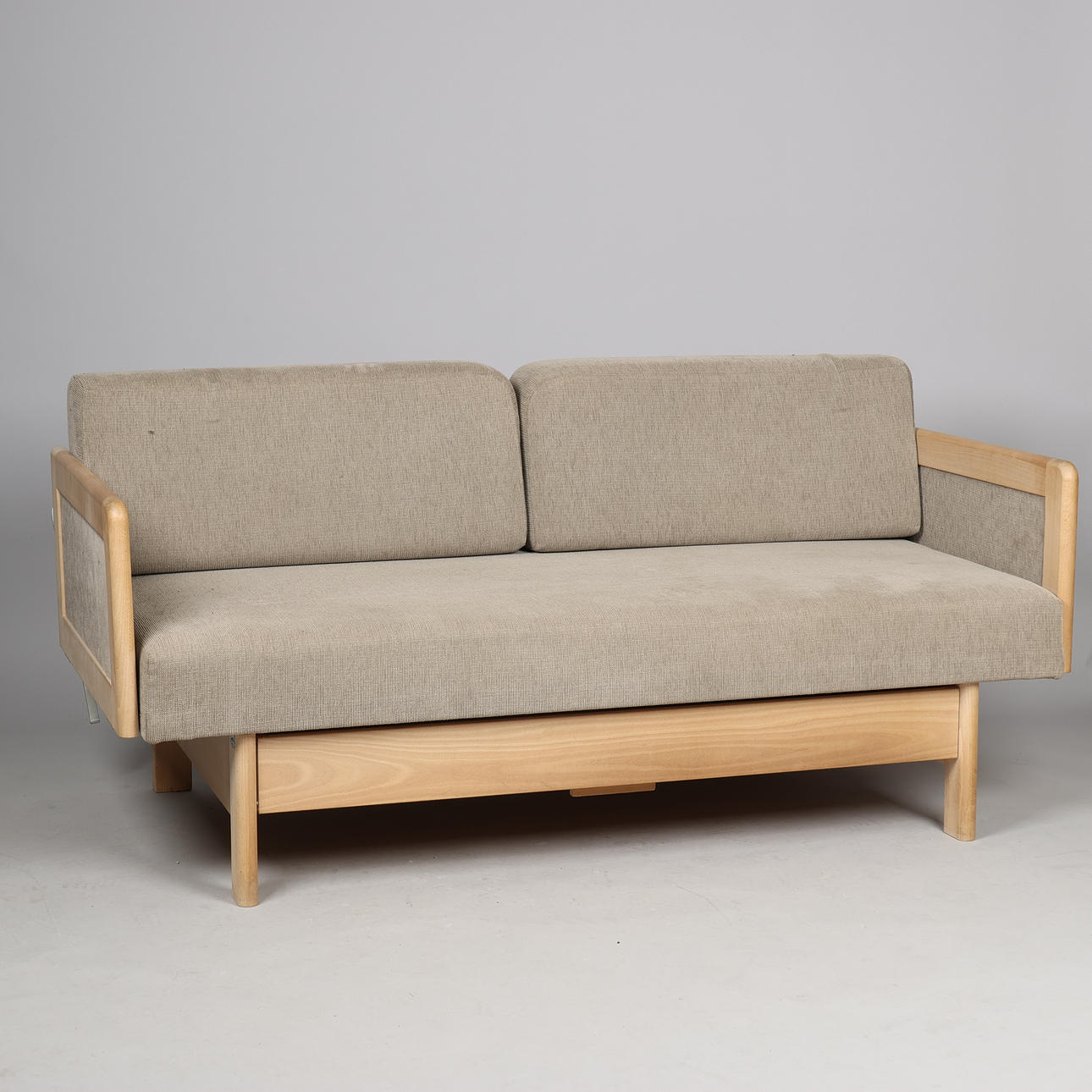 Sofa bed in beech with fabric upholstered armrests, seat and backrest, storage drawer under the seat, Danish furniture manufacturer, Denmark, 1900s (1+1).