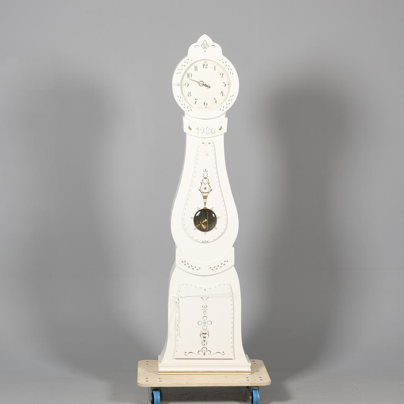 A FLOOR CLOCK, Westerstrand, dated 1986.