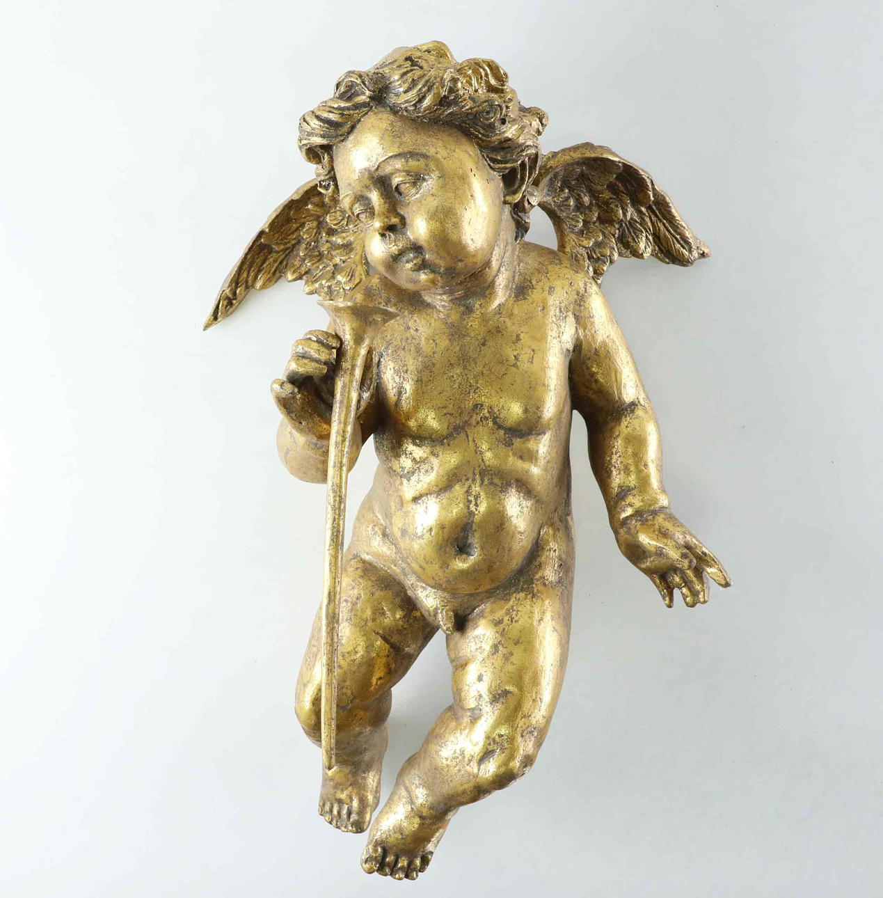 A gilded cherub, 20th century.