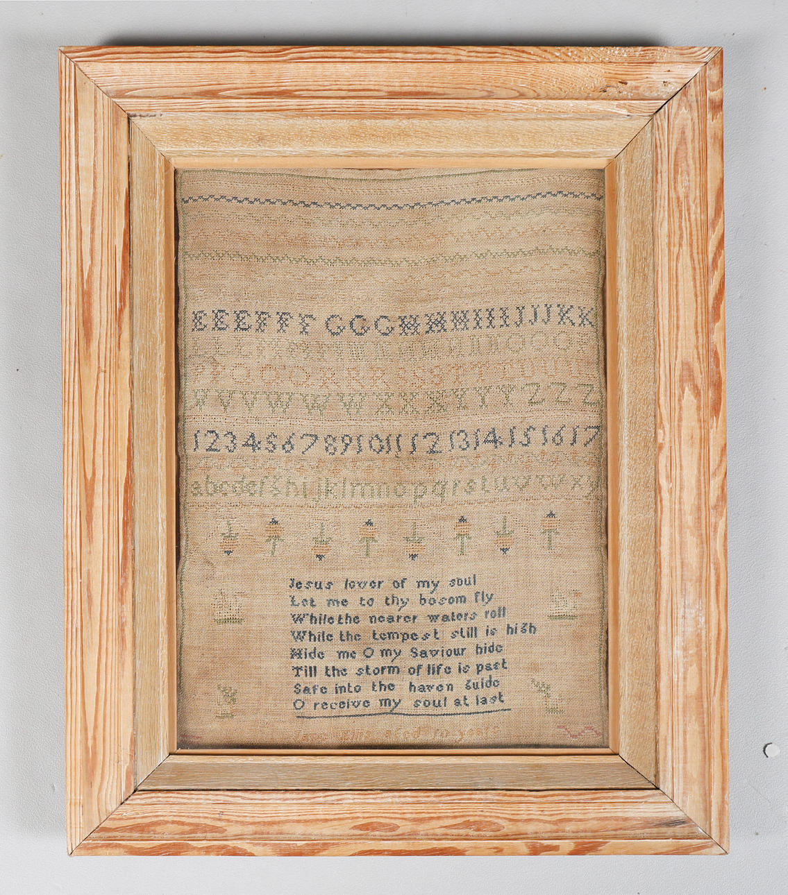 A VICTORIAN NEEDLEWORK SAMPLER.