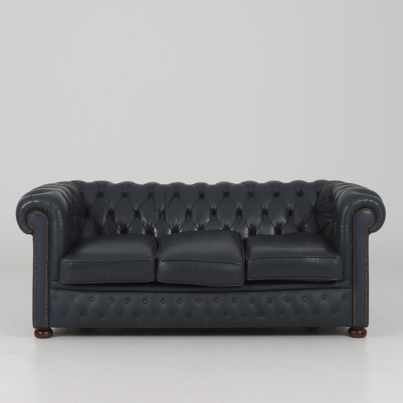 A Chesterfield model sofa from Winchester furniture, England, later part of the 20th century.