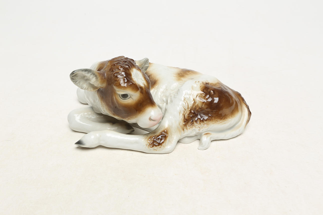 CALF FIGURINE, porcelain, signed with crown stamp.