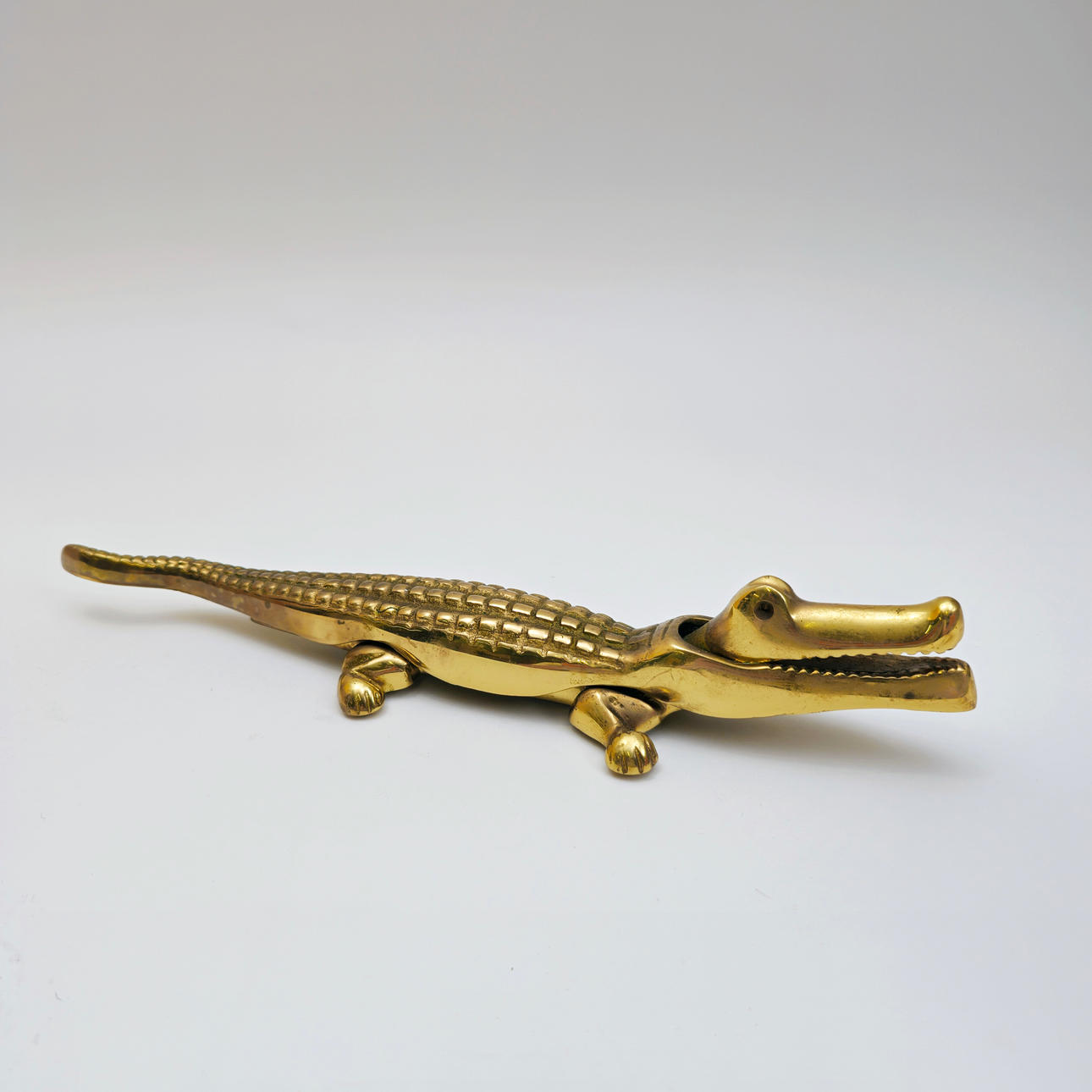 CROCODILE NUTCRACKER IN GILDED BRONZE.
