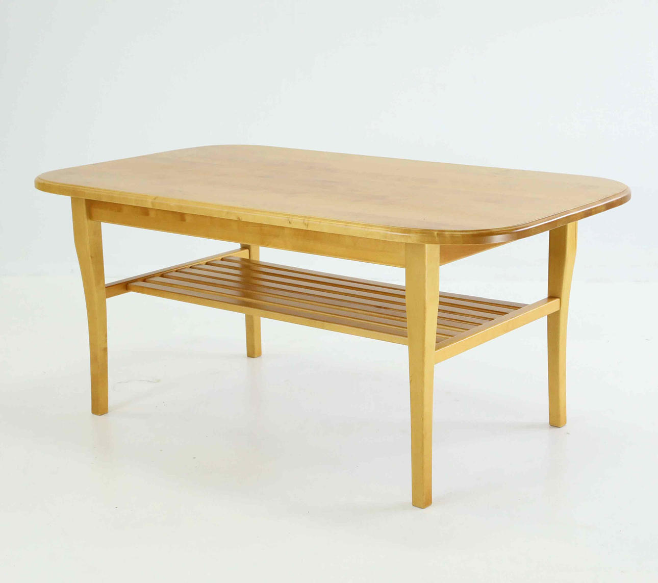A 20th century birch coffee table.