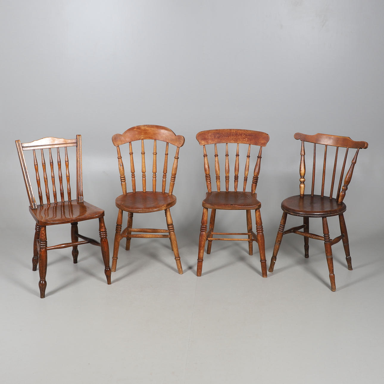 FOUR SINGLE CHAIRS, THREE WITH SOLID ELM SEATS.