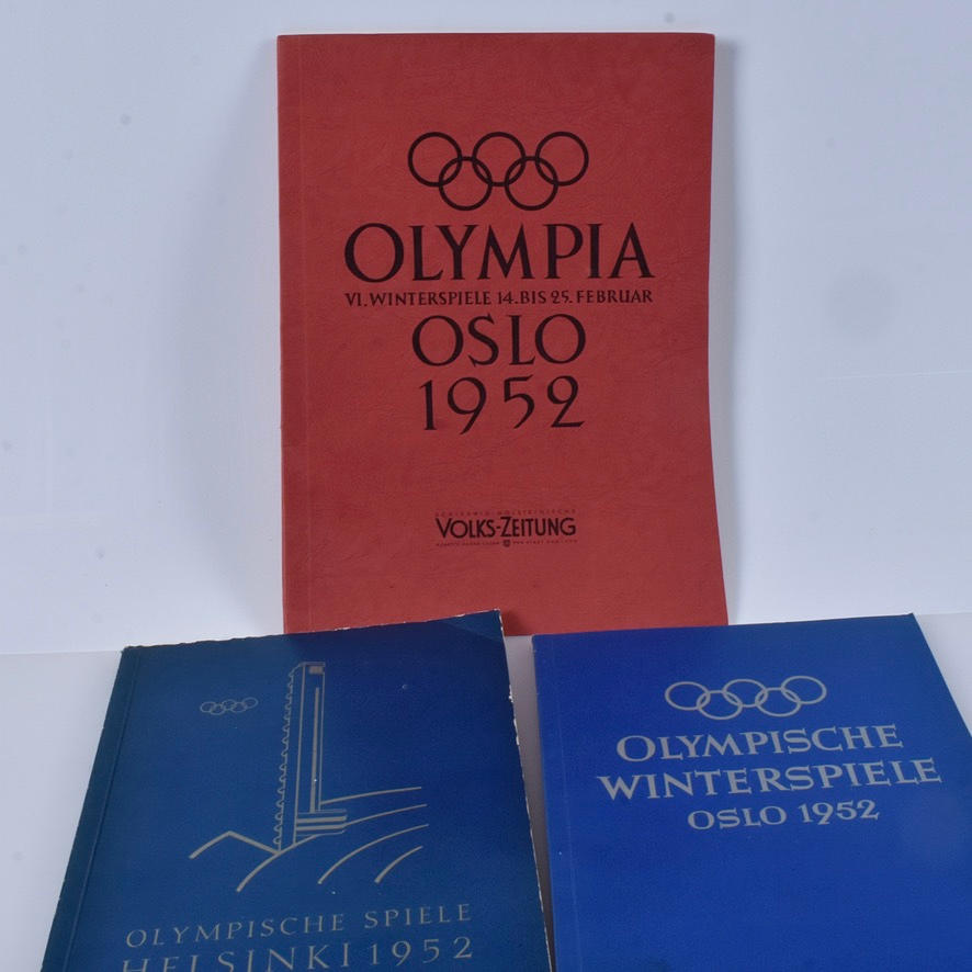 OLYMPIC ALBUMS, with pasted badges.