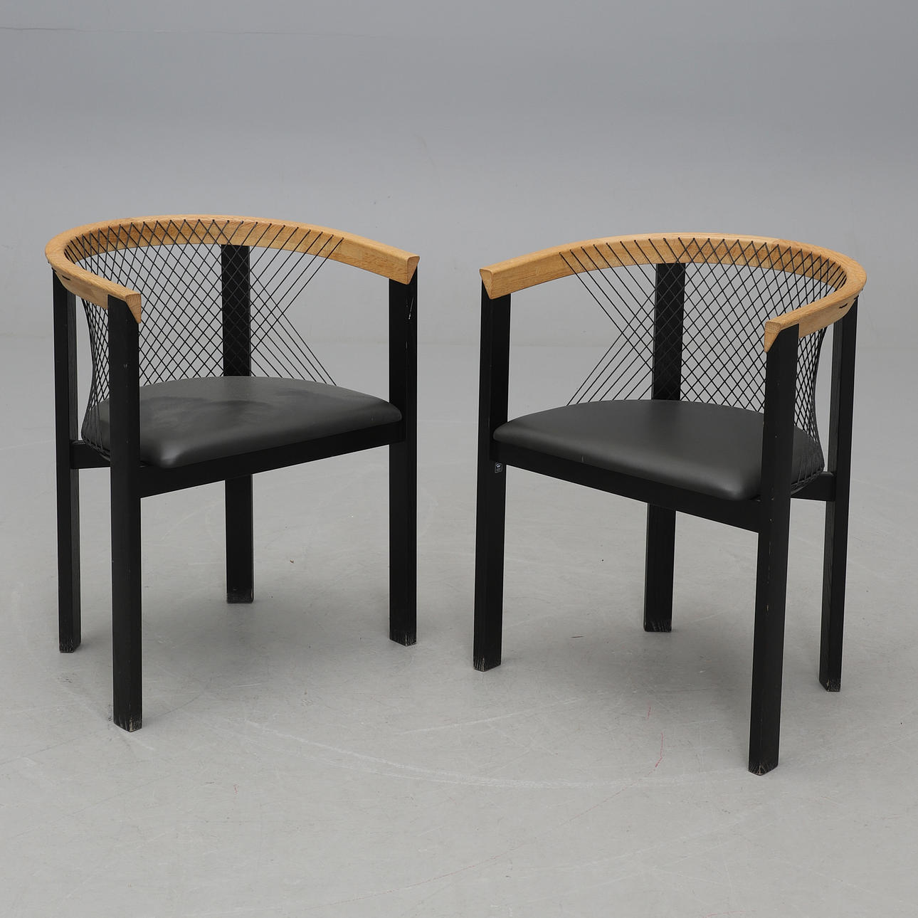 A pair of “String” armchairs by NIELS JØRGEN HAUGESEN, Tranekær Furniture, Denmark.