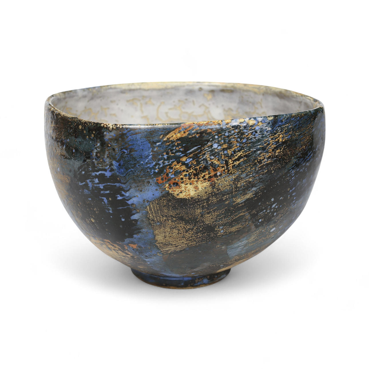 A 20th century stoneware bowl, glaze., monogram signed.