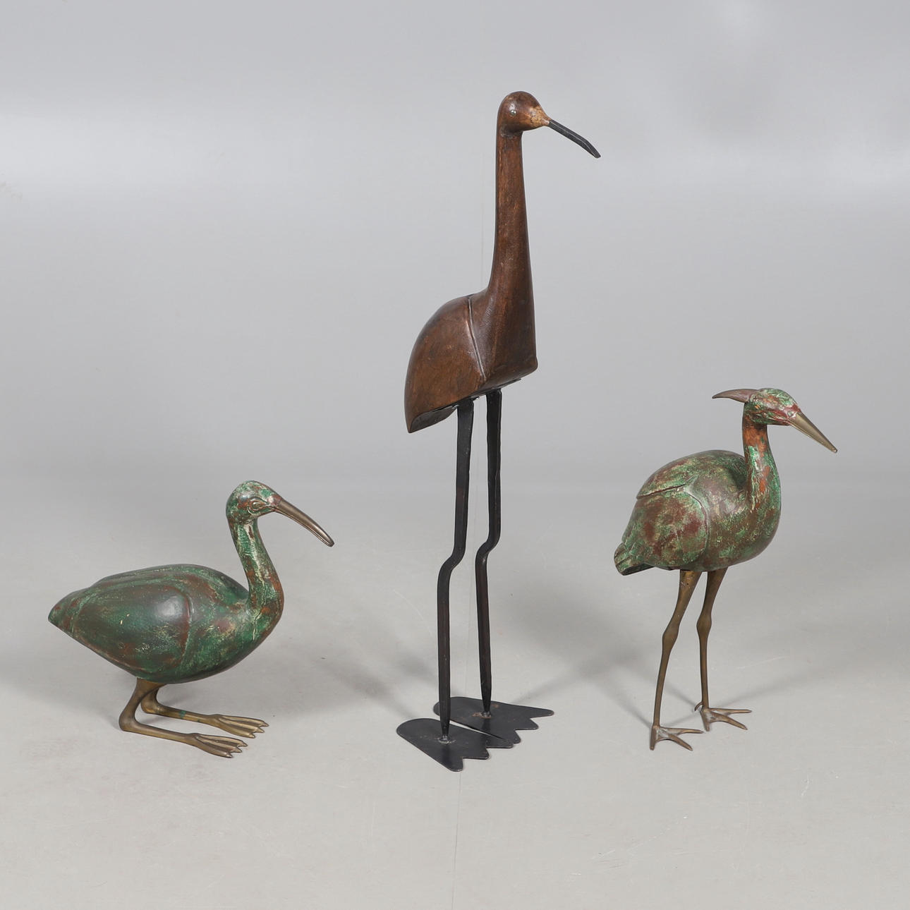 TWO MIXED MEDIA BIRD SCULPTURES.