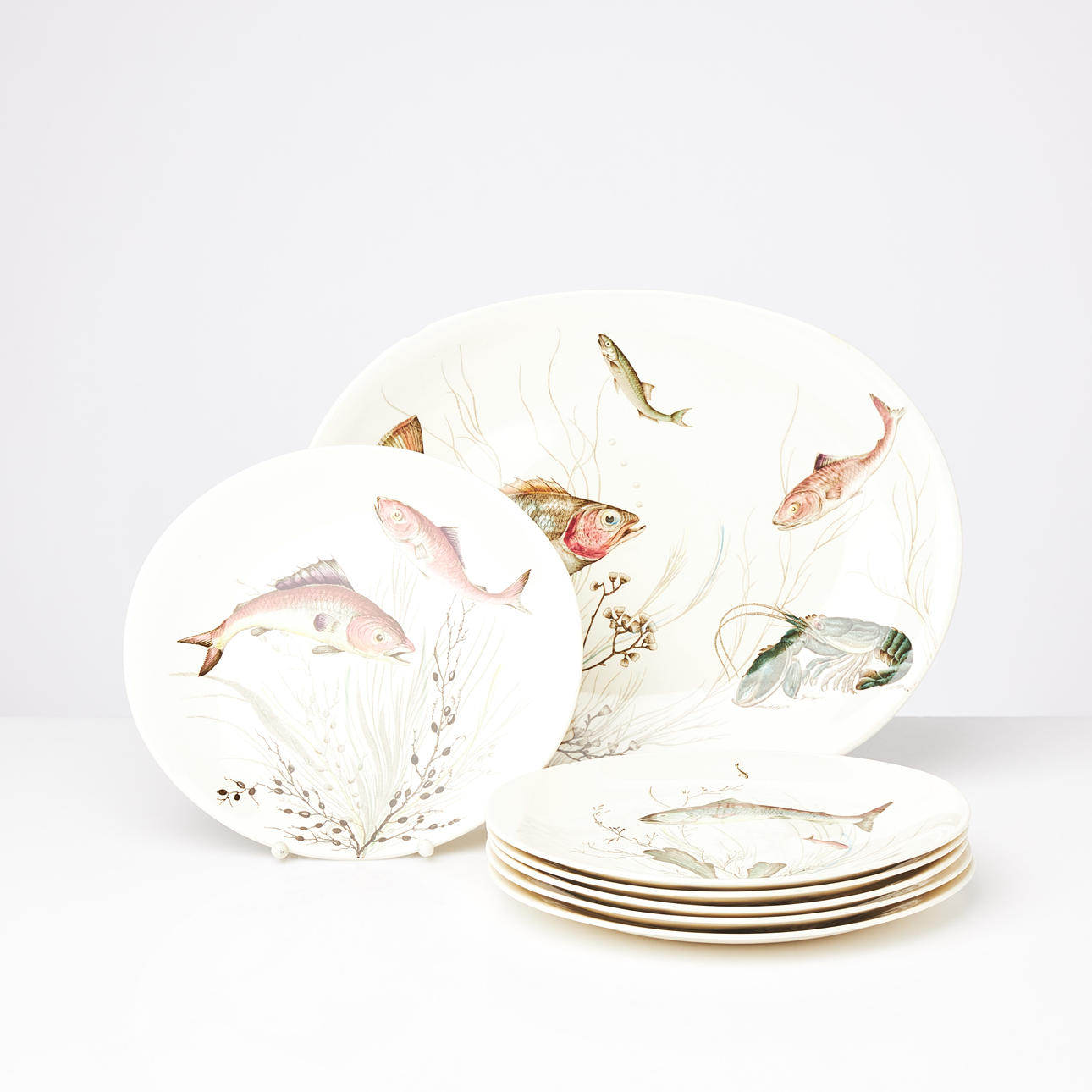 A set of 6+1 “Fish” plates from Johnson Bros, flintware, England, second half of the 20th century.