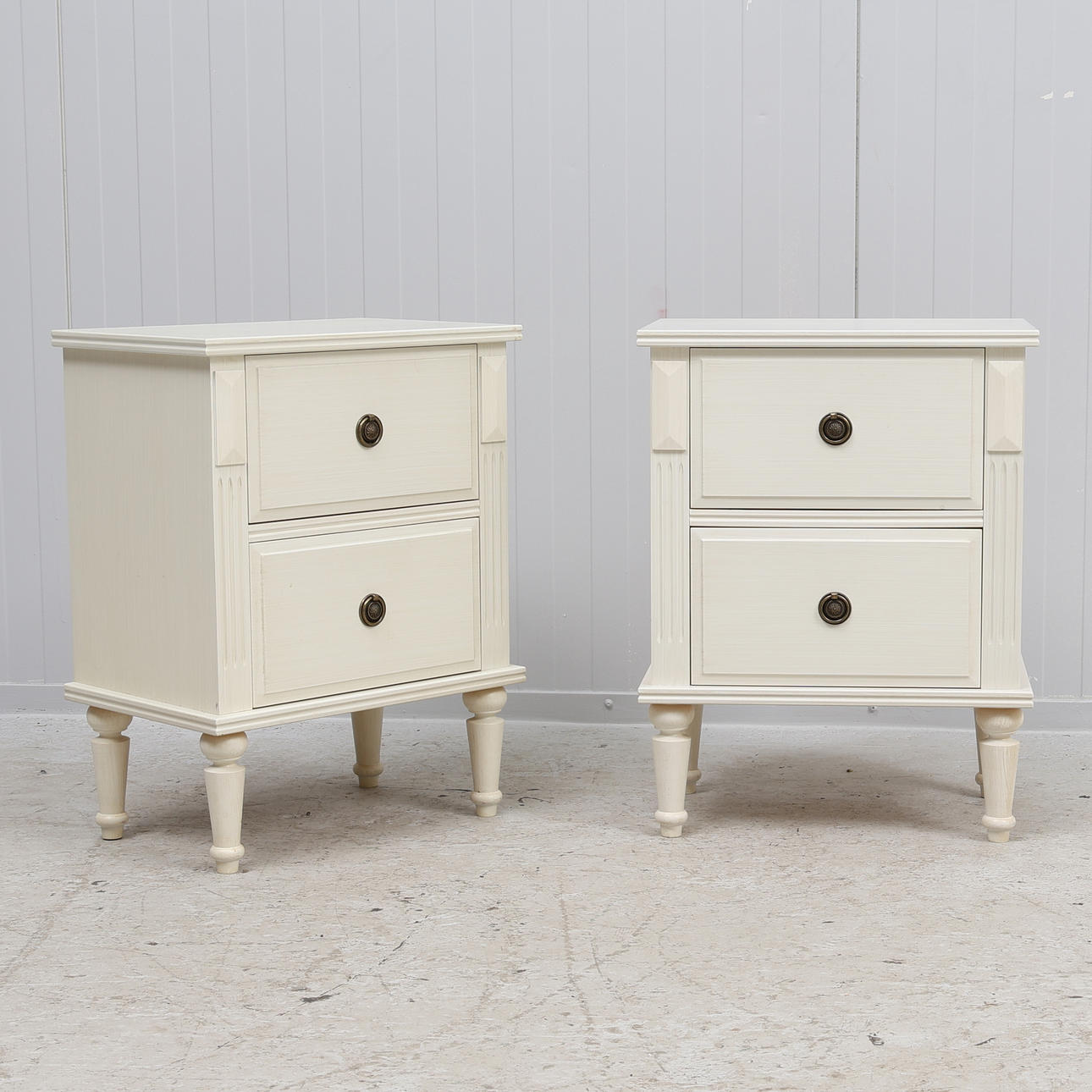 A pair of Gustavian-style bedside tables, late 20th century.