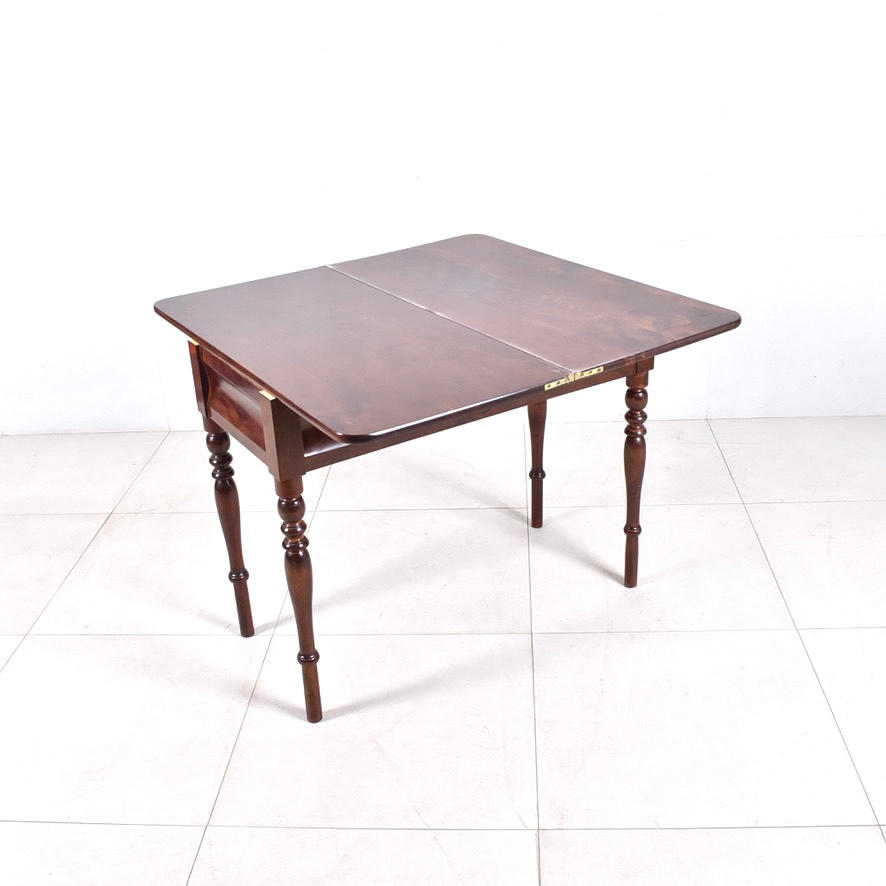 A 19th century mahogany gaming table.