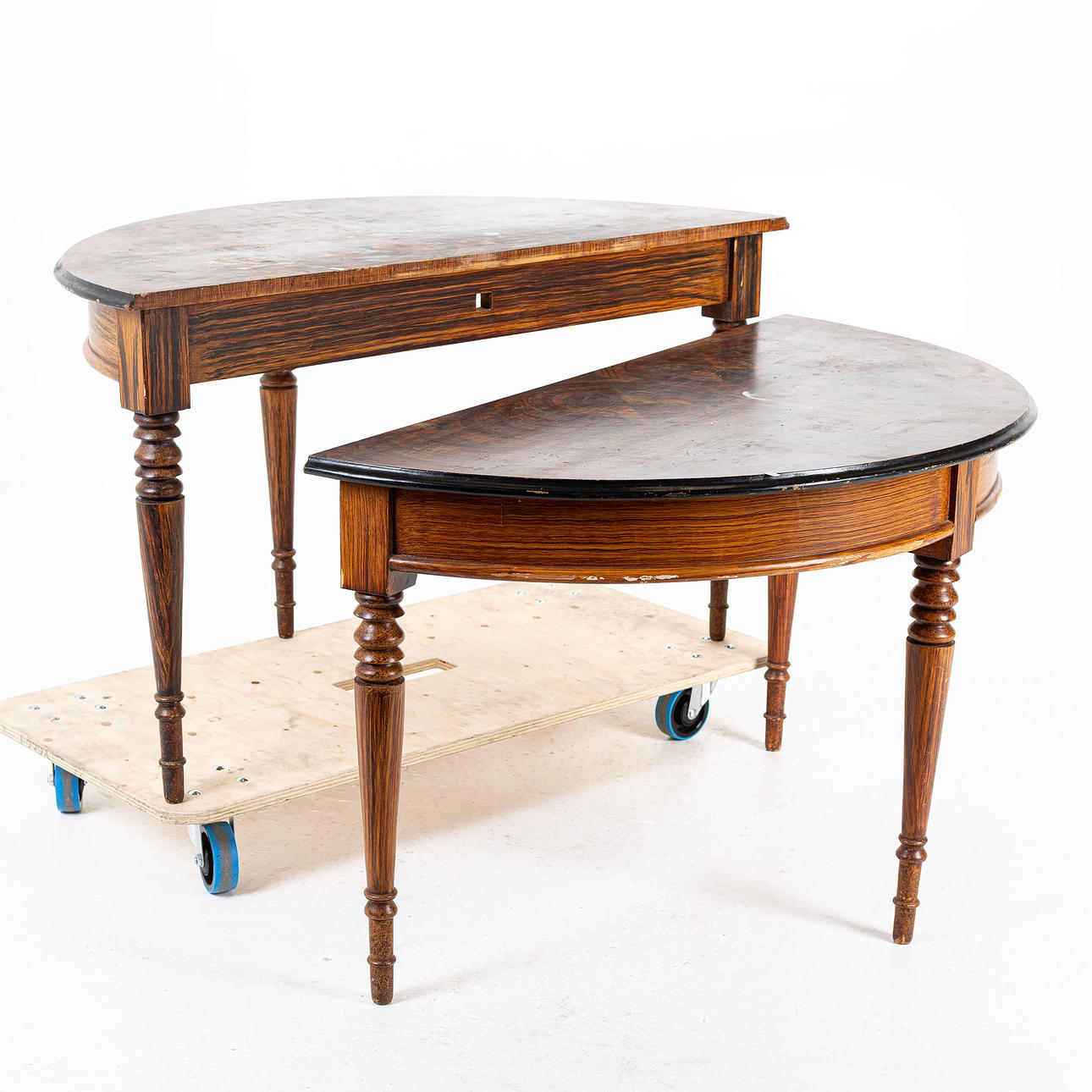 A pair of half-moon tables, painted with a vein pattern, the turn of the century 1900.