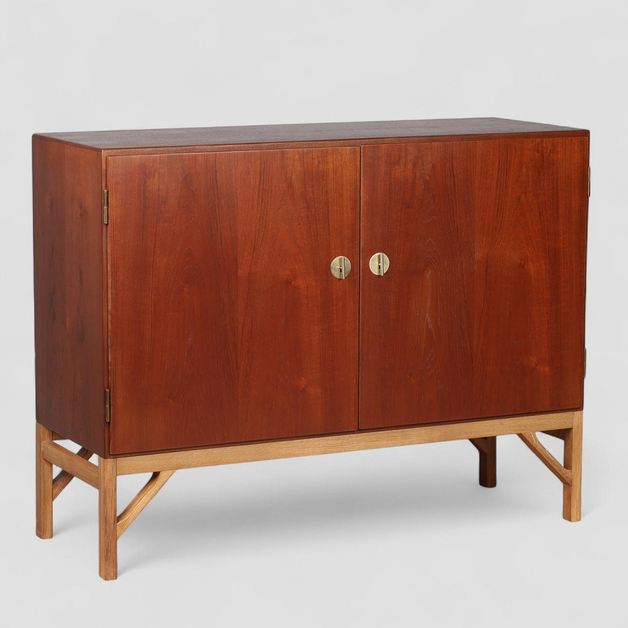 BØRGE MOGENSEN. Sideboard of veneered teak with solid oak base and brass fittings, C. M. Madsen, FBD, Model A 232, Denmark, 1950/1960s.