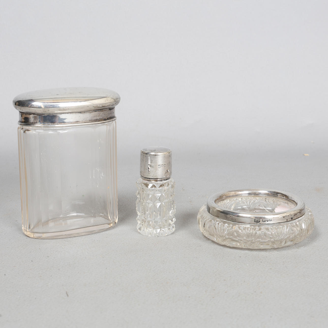 THREE SILVER MOUNTED DRESSING TABLE POTS (3).