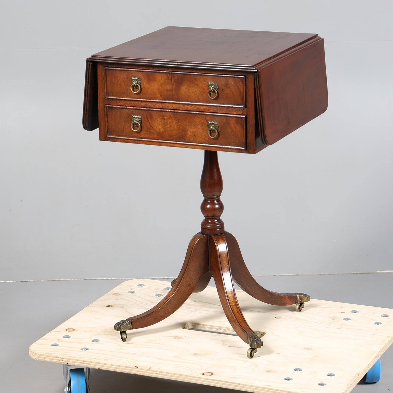 A GEORGE III STYLE MAHOGANY WORK TABLE.