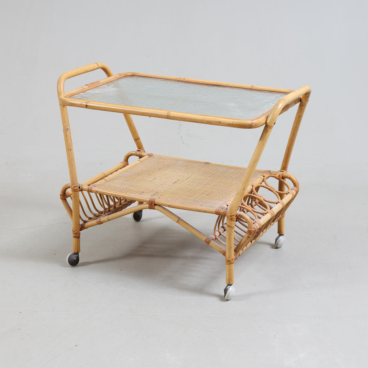 A bamboo & raw glass serving trolley, 20th century.