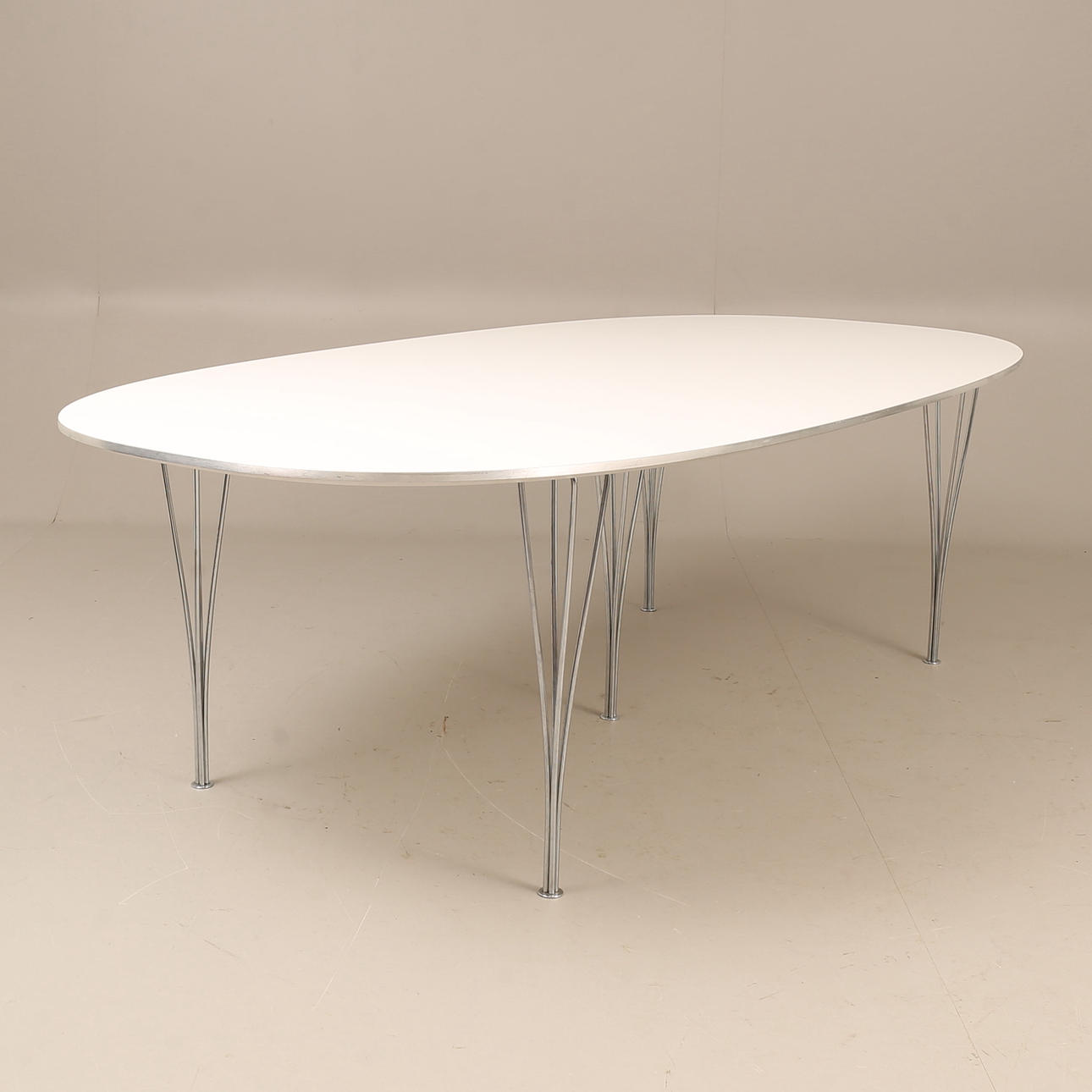 BRUNO MATHSSON & PIET HEIN. Dining table, “Superellips”, Fritz Hansen, Denmark.